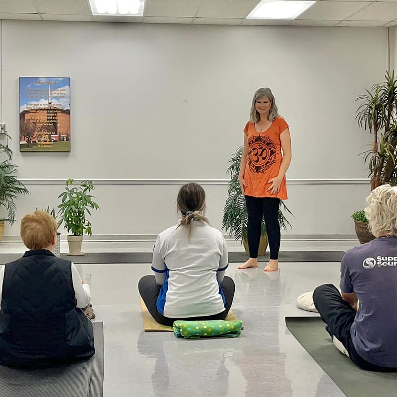 Yoga lesson being taught in a London Ontario studio